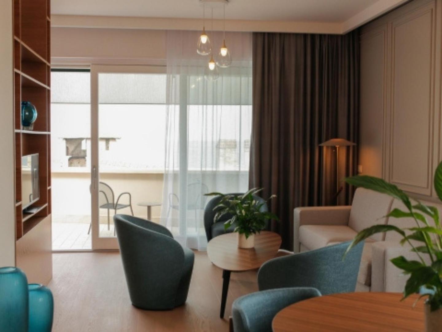 Grand Hotel Terme Sirmione Kültér fotó A living room in a modern apartment
